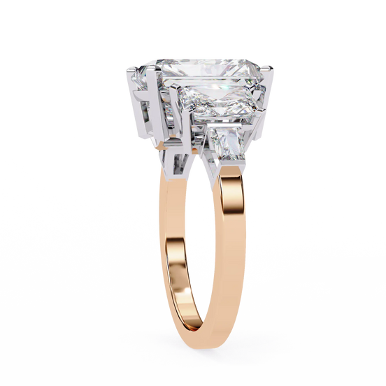 Rose gold ring with a large diamond on a white background