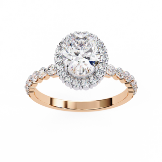 Oval cut lab grown diamond halo engagement ring in rose gold with round diamond band
