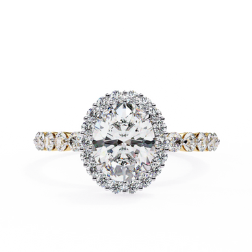 Oval cut lab grown diamond halo engagement ring in yellow gold with round diamond band