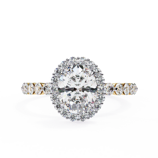 Oval cut lab grown diamond halo engagement ring in yellow gold with round diamond band