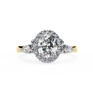 Oval cut lab grown diamond halo engagement ring in yellow gold with pear side diamonds