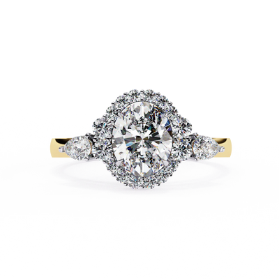 Oval cut lab grown diamond halo engagement ring in yellow gold with pear side diamonds