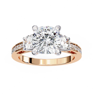 Cushion cut lab grown diamond three-stone engagement ring with pavé split shank in rose gold