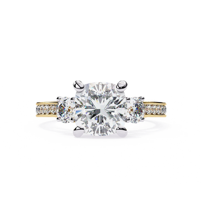 Cushion cut lab grown diamond three-stone engagement ring with pavé split shank in yellow gold