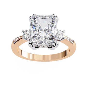 Radiant cut lab grown diamond three-stone engagement ring with round side diamonds and channel-set shoulders in rose gold