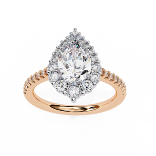 pear diamond graduated halo ring in rose gold
