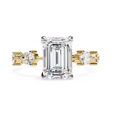 Radiant cut lab grown diamond side-stone engagement ring in yellow gold