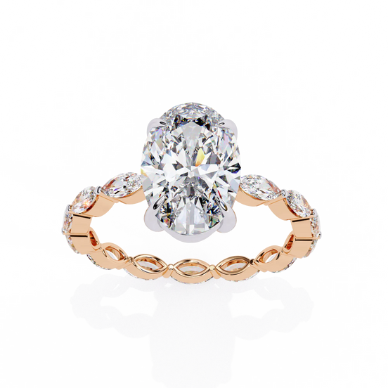 Oval cut lab grown diamond side-stone engagement ring in rose gold with marquise diamond band