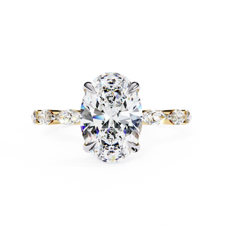 Oval cut lab grown diamond side-stone engagement ring in yellow gold with marquise diamond band