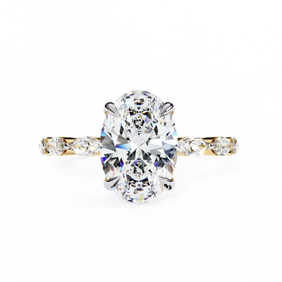 Oval cut lab grown diamond side-stone engagement ring in yellow gold with marquise diamond band