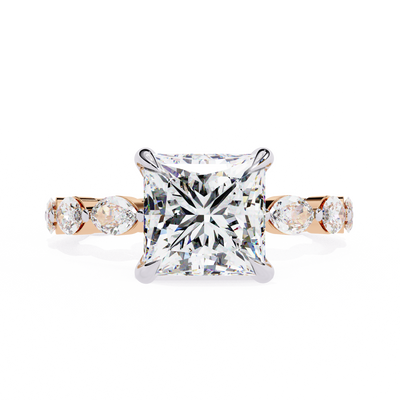 Front-facing view of a rose gold princess cut diamond ring with marquise side stones.