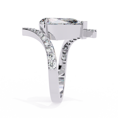 Side profile view of a white gold pear diamond bypass pavé ring.