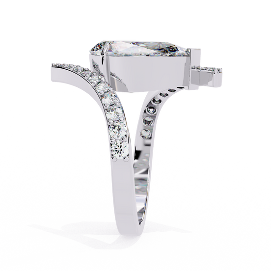 Side profile view of a white gold pear diamond bypass pavé ring.