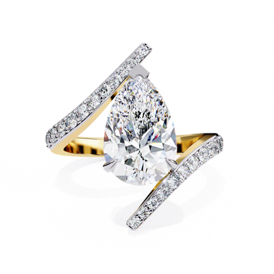 Front-facing view of a yellow gold pear diamond bypass pavé ring.