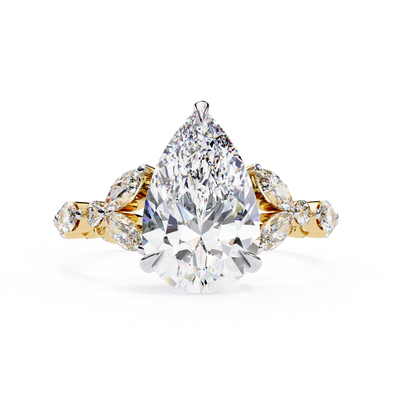 Front-facing view of a yellow gold pear diamond ring with marquise side stones.