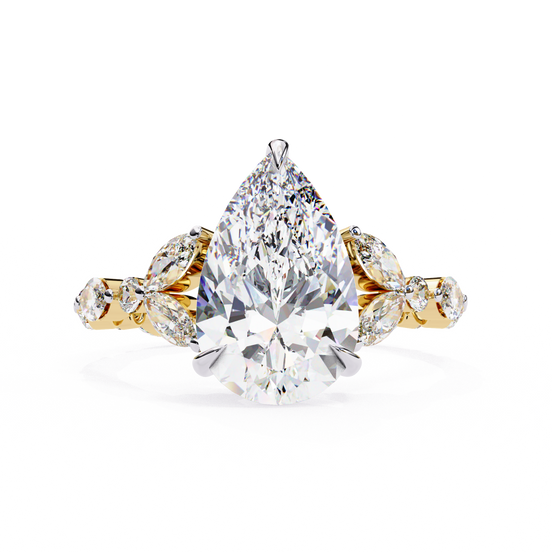 Front-facing view of a yellow gold pear diamond ring with marquise side stones.