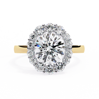 Front-facing view of a yellow gold celeste round halo diamond ring.