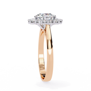 Side profile view of a rose gold celeste round halo diamond ring.