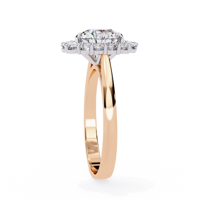 Side profile view of a rose gold celeste round halo diamond ring.