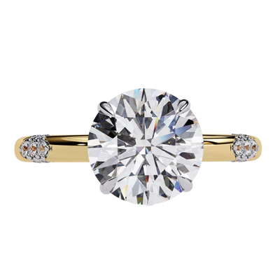 round hidden halo engagement ring in yellow gold
