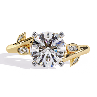 round diamond vine engagement ring in yellow gold
