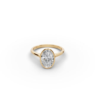 2 ct Oval Lab Grown Diamond Bezel Solitaire Ring in yellow gold, front view