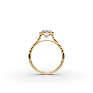2 ct Oval Lab Grown Diamond Bezel Solitaire Ring in yellow gold, view 2