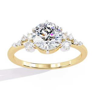Round lab grown diamond side stone engagement ring in yellow gold