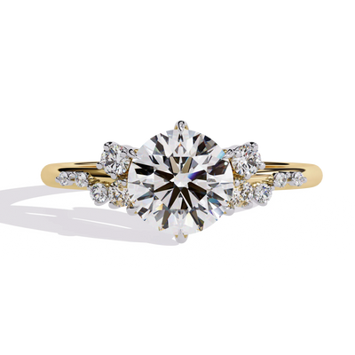 Round lab grown diamond side stone engagement ring in yellow gold