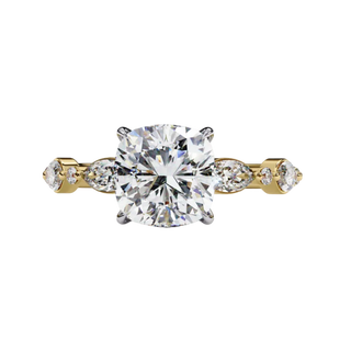 Yellow gold cushion cut diamond ring, front view.