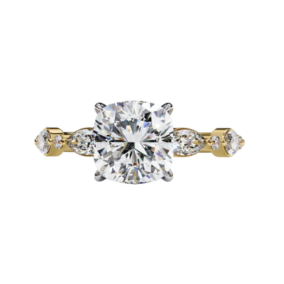 Yellow gold cushion cut diamond ring, front view.