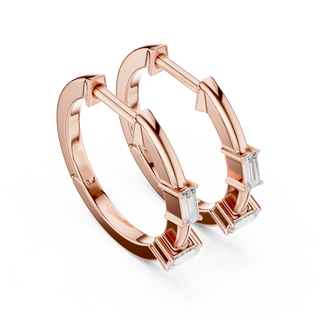 Side profile of rose gold minimal geometric baguette diamond hoop earrings.
