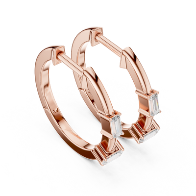 Side profile of rose gold minimal geometric baguette diamond hoop earrings.