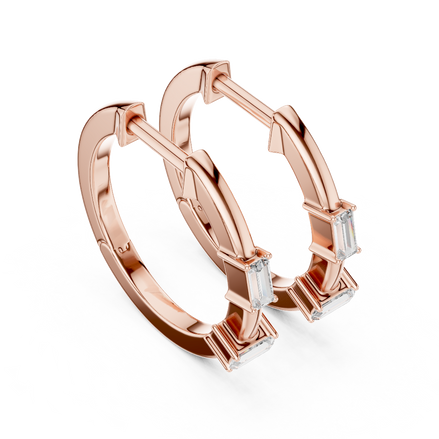 Side profile of rose gold minimal geometric baguette diamond hoop earrings.