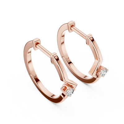 Side profile of rose gold minimal geometric chevron diamond hoop earrings.