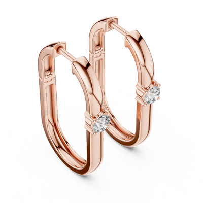 Side profile of rose gold minimal oval solitaire diamond hoop earrings.