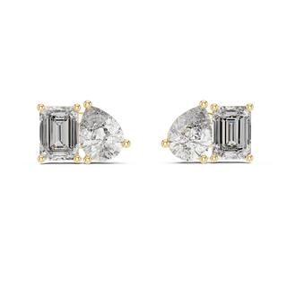 Front view of Harmony Duo diamond stud earrings in yellow gold with pear and emerald cut diamonds.