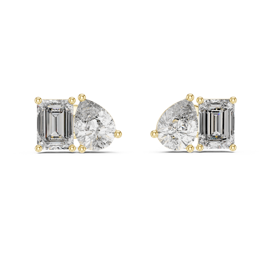 Front view of Harmony Duo diamond stud earrings in yellow gold with pear and emerald cut diamonds.