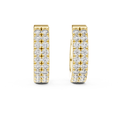 Front view of Celestial double row diamond huggie earrings in yellow gold.