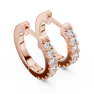 Side profile of rose gold elegant U-cut round diamond huggie hoops.