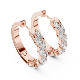 Side profile of rose gold luxurious shared-prong marquise diamond hoops.