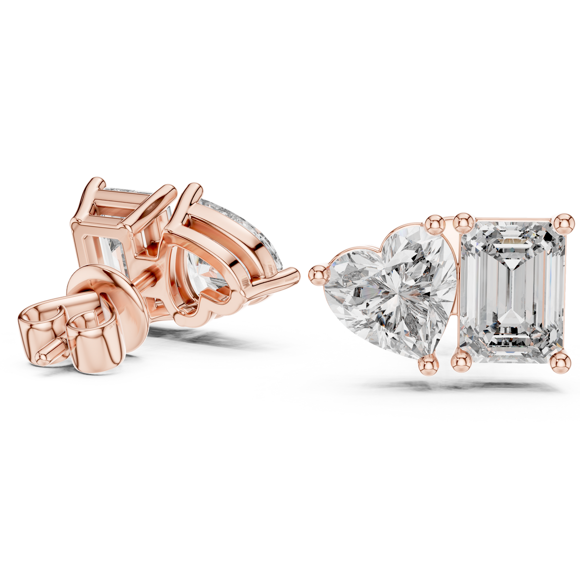 Heart and emerald cut diamond stud earrings in rose gold finish