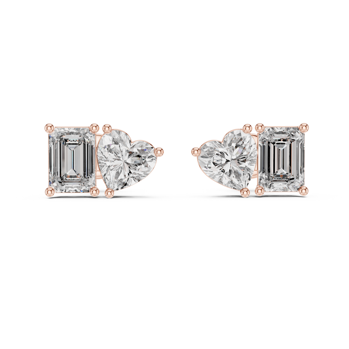 Heart and emerald cut diamond stud earrings in rose gold finish