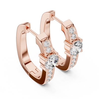 Side profile of rose gold halo diamond huggie hoop earrings.
