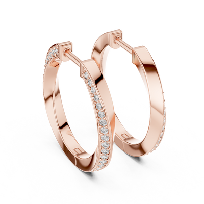 Side profile of rose gold classic round diamond huggie hoop earrings.