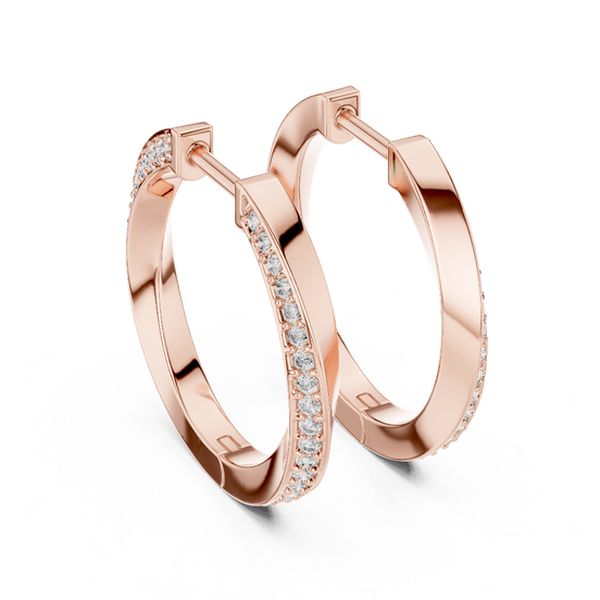 Side profile of rose gold classic round diamond huggie hoop earrings.