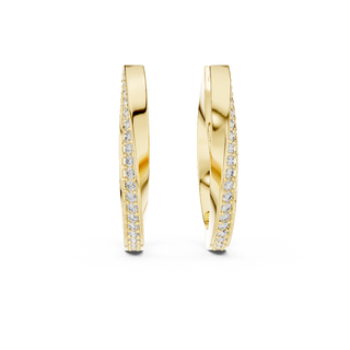 Front view of Classic Pavé diamond huggie earrings in yellow gold.