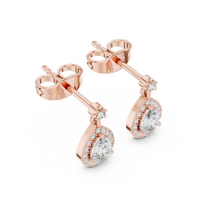 Side profile of rose gold pear-shaped diamond drop earrings.