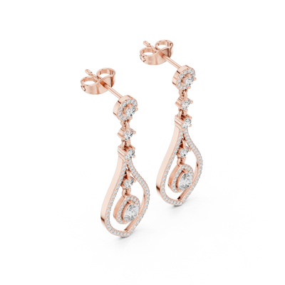 Side profile of rose gold pear-shaped diamond drop earrings.