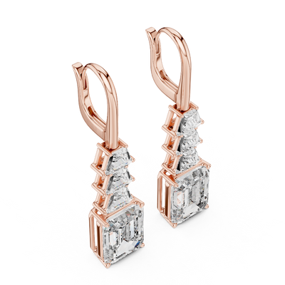 Side profile of rose gold geometric art deco diamond drop earrings.